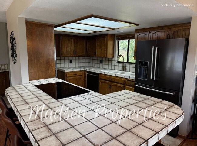 Foto del edificio - 6367 Woodman Dr