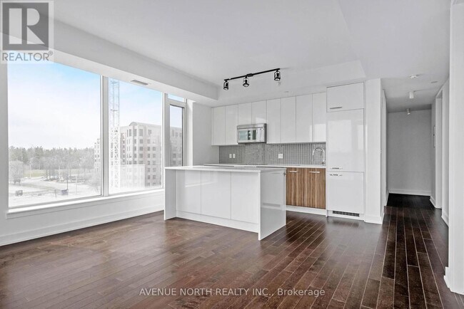 Building Photo - 111-111 Champagne Ave S
