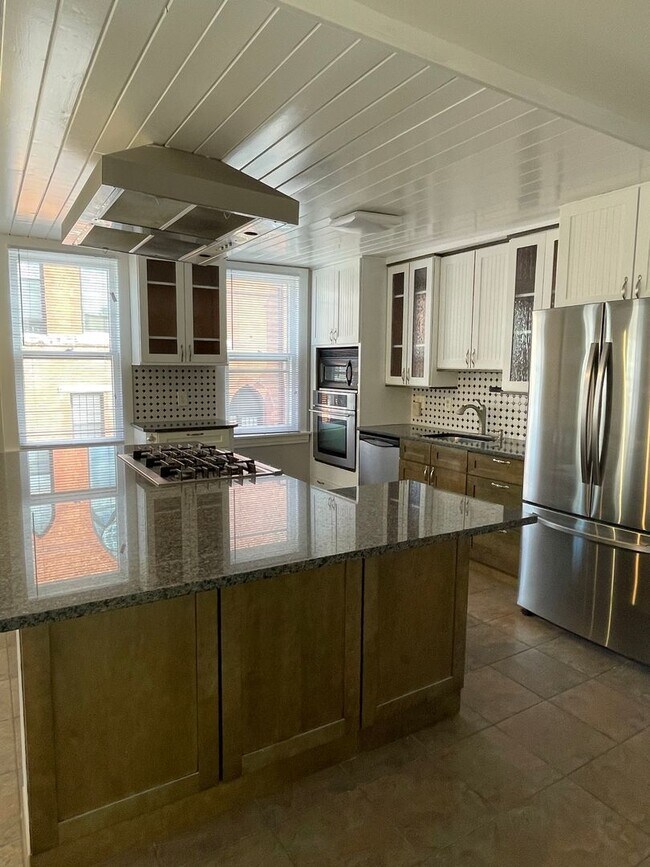 Building Photo - Small pets are welcome with an additional ...