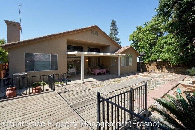 Building Photo - 3 br, 2 bath House - 5862 W. Fir Avenue