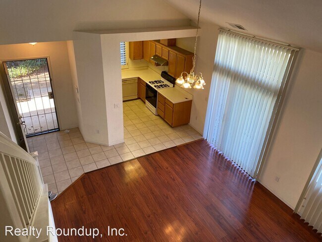 Building Photo - 3 br, 3 bath House - 6318 Laguna Mirage Ln