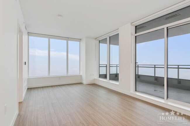 Building Photo - Welcome to Flamingo One, a landmark tower in Surrey Central!