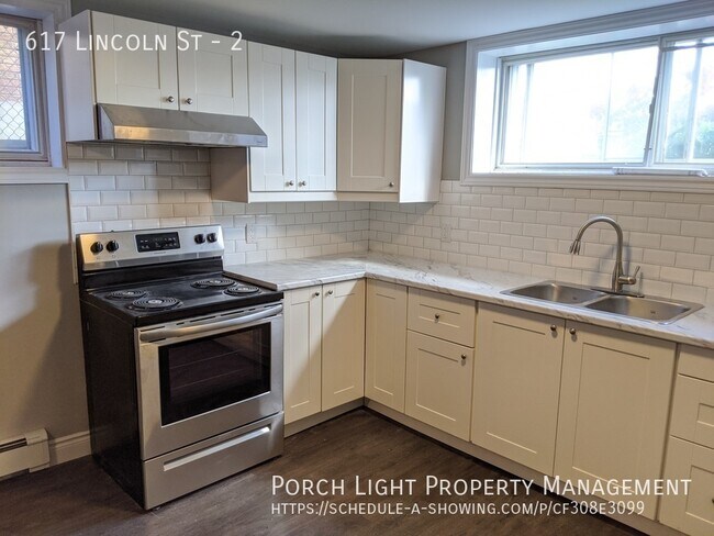 Building Photo - Bright and Sunny 2 Bedroom Basement with Yard, Parking and Tons of Storage