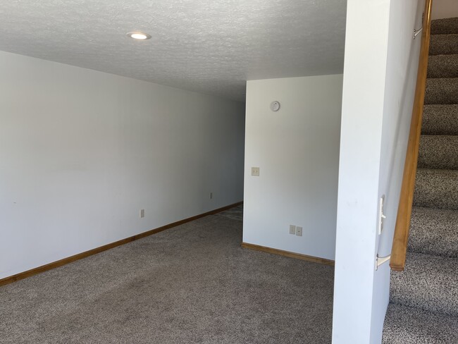 Living Room/Stairs from Front Door - 118 Willadine Dr