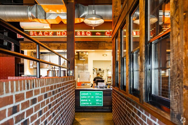 Get back to your southern roots at Black Hog Bbq, Located in Urbana Village Shopping Center.