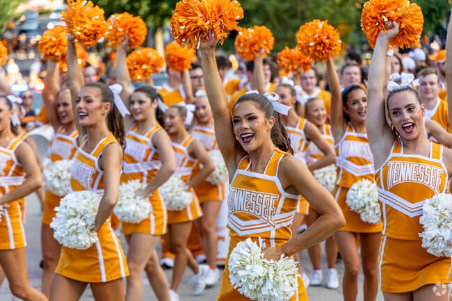 University of Tennessee cheerleaders pump up the crowd on the Vol Walk.