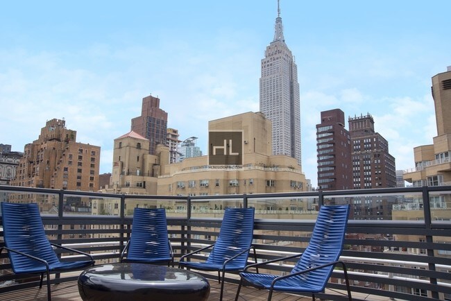 Building Photo - Park Avenue Luxury! No Fee!