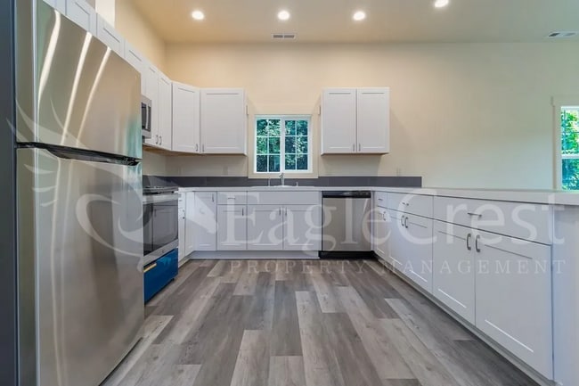 Building Photo - Remodeled Four Bedroom House Located Near ...