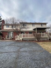 Building Photo - 9118 Riverdale Ave