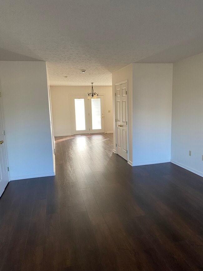 Living room looking into dining room. - 717 Terrace Ct
