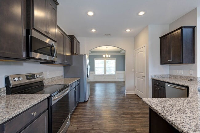 Building Photo - 4BR/3.5BA · 2,809 SF · Owner's Suite on Main · Fenced Yard · Midland, GA — $2,800/mo