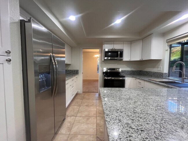Building Photo - Fully Remodeled Kitchen and Baths in Spacious 4-Bedroom Home