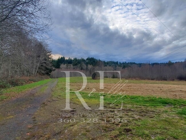 Building Photo - Stunning Secluded 5 Acre Paradise