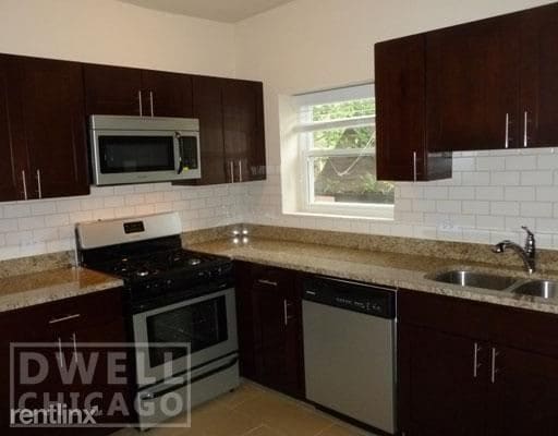 Building Photo - 2 br, 1 bath Apartment - 4740 S Greenwood Ave