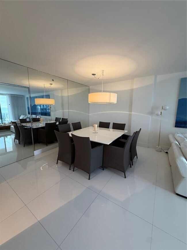 Building Photo - 10275 Collins Ave