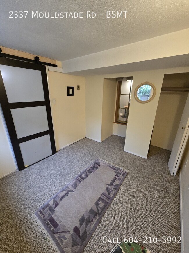 Photo du bâtiment - Cozy Basement Suite - Utilities Included