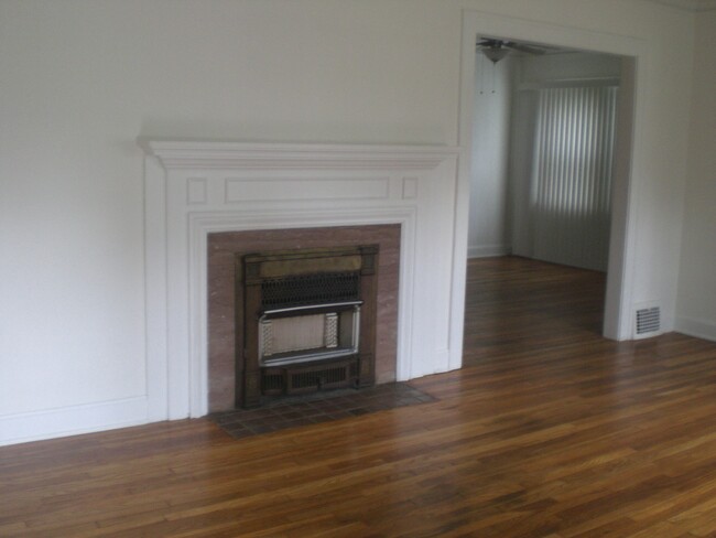 Living Room fireplace with mantel - 18519 Chagrin Blvd