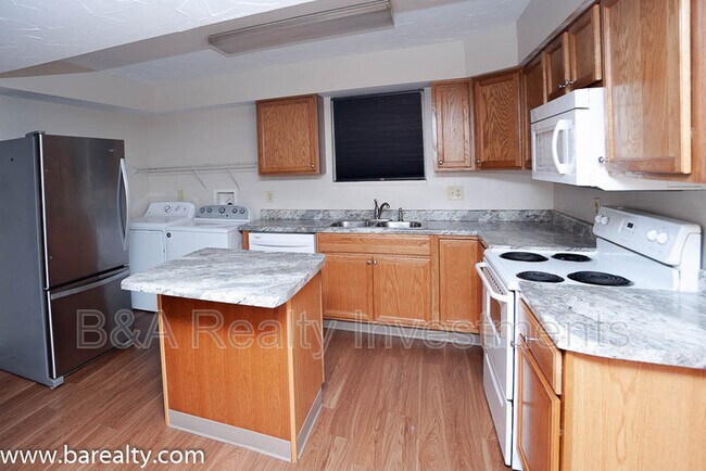 Building Photo - 100 E 13th Ave