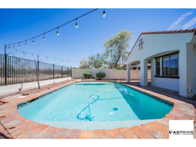 Foto del edificio - Resort-Style Living in Estrella Mountain Ranch - Private Pool, Solar &amp; Privacy