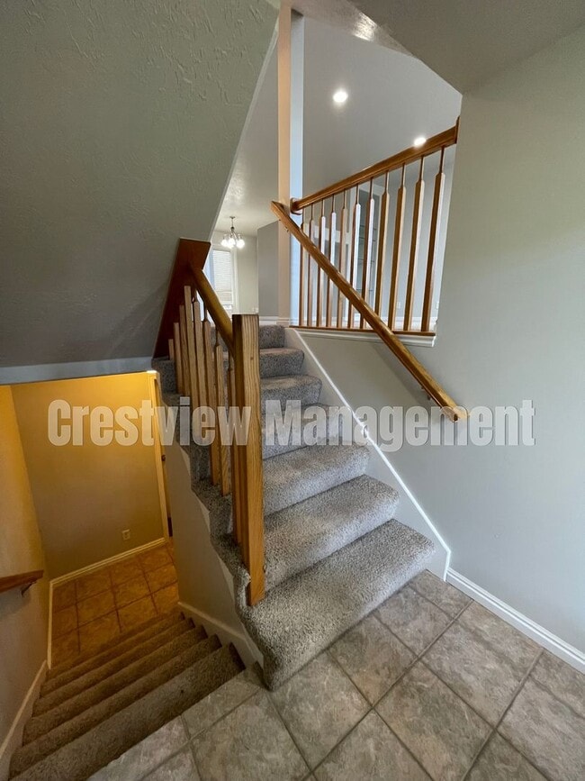 Photo - Charming 3-Bedroom Townhome with Garage in Sandy - Get $300 off First Month's Rent!