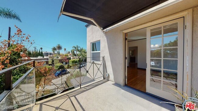 Building Photo - 1 br, 1.5 bath Condo - 9001 Lloyd Pl