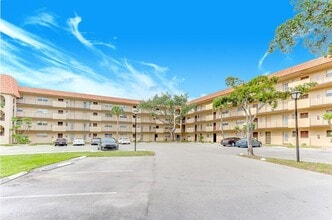Building Photo - 6301 N Falls Cir Dr