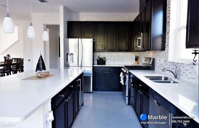 Foto del edificio - 3 br, 3 bath House - 8271 Bayliss Ct