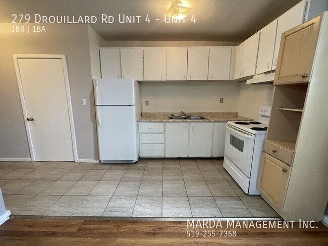 Photo du bâtiment - SPACIOUS 1 BED/1 BATH UNIT IN SECURE WALKERVILLE  BUILDING + HYDRO