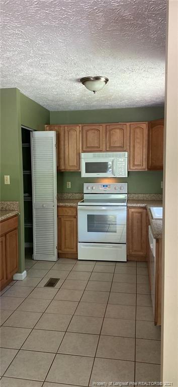 Building Photo - 5237 Farmall Dr