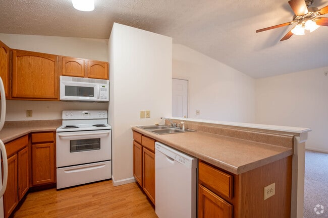 1BR, 1BA - 654SF - Kitchen - Winfield Farms - Garages Available Apartments