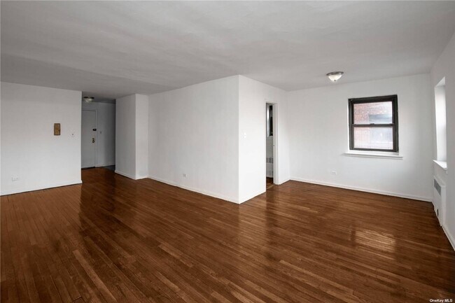 Building Photo - 94-30-94-58 58th Ave