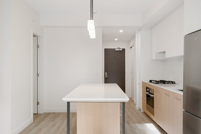 Photo du bâtiment - 730-502 2 Ave SW