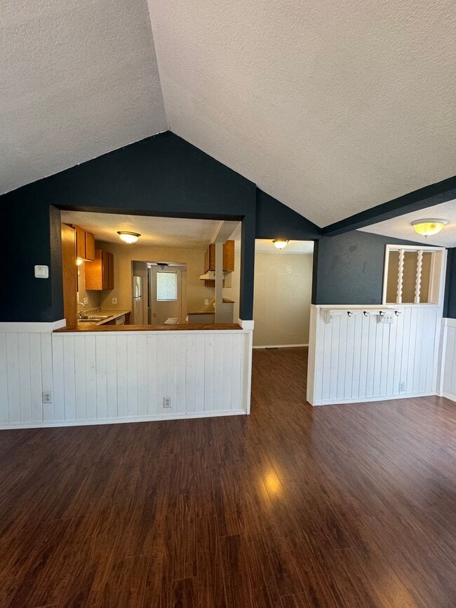 Building Photo - Hard to find studio with all utilities included and fenced yard!