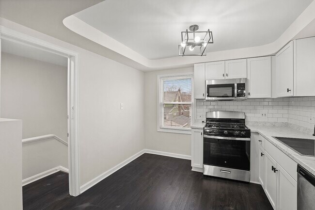 Building Photo - 13645 Cedar Road, Unit Up Unit