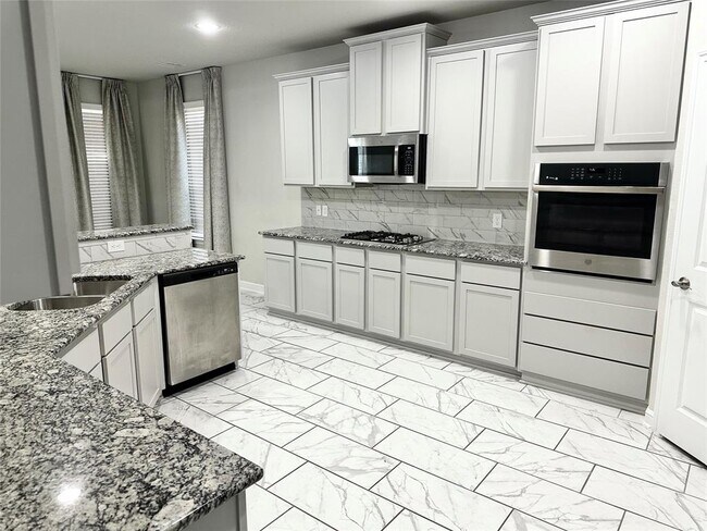 Foto del edificio - 5026 Lacebark Pne Trl