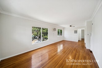 Building Photo - 7571 Willoughby Ave