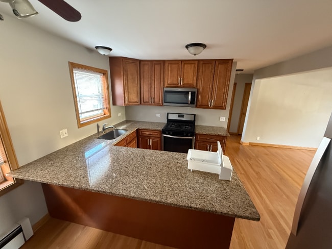 Building Photo - 4400 N Mango Ave