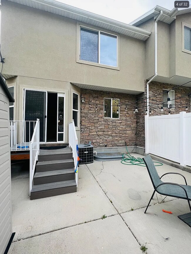 Building Photo - Spacious End-Row Townhome