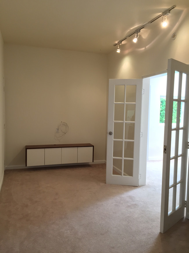 Den with view into bedroom - 1312 N Beverly Glen Blvd