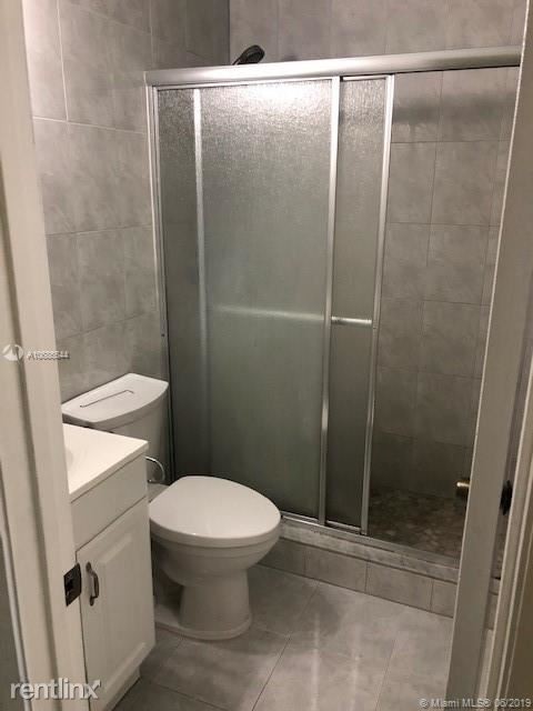 Building Photo - 3 br, 2 bath House - 9351 SW 4th Ln # 0