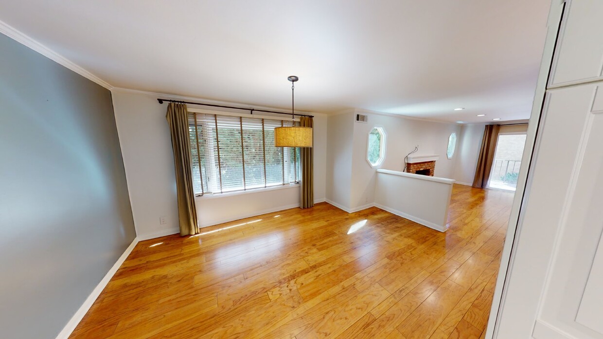 Primary Photo - Beautiful 2-Bedroom Townhouse-Style Condo ...