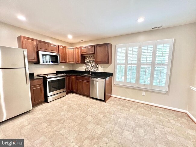 Foto del edificio - 5504 Woodlawn Manor Ct