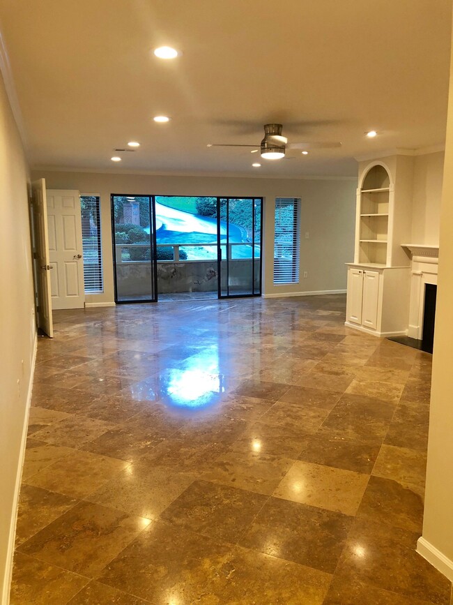 Living Room with Balcony-marble flooring everywhere - 25116 Plantation Dr NE