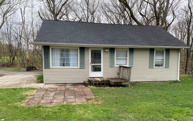 Front of house with Patio - 6909 W 131st Ave