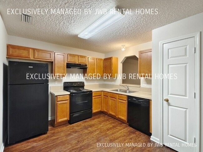 Building Photo - 8479 McGirts Village Ln
