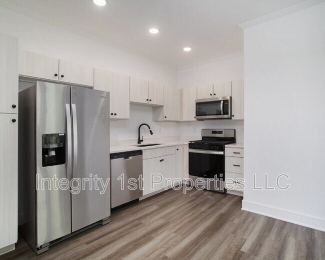 Foto del edificio - 8827 N Helena Ave