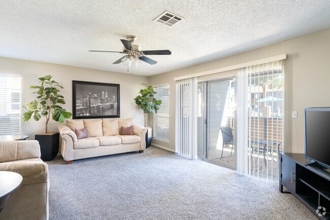 2BR, 1BA - 965SF - Living Room - Wind Tree