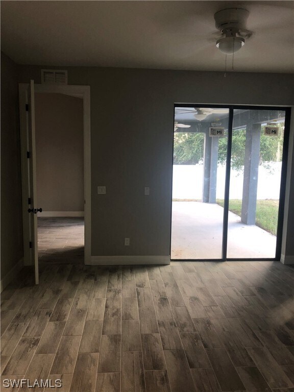 Building Photo - 8750 Cypress Lake Dr