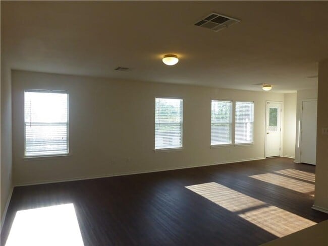 Building Photo - Generous Four Bedroom, Three Bath Home with Large Yard