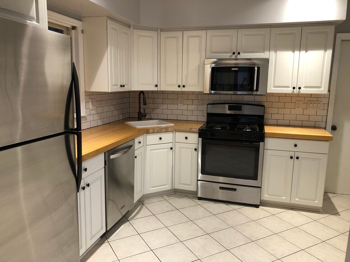 New counters and backsplash - 65 Howard St